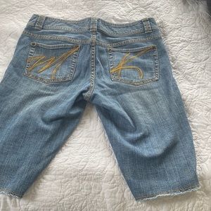 Mk short great condition is 20” inches long and 34 INCHES WAIST